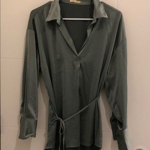 Green silk blouse